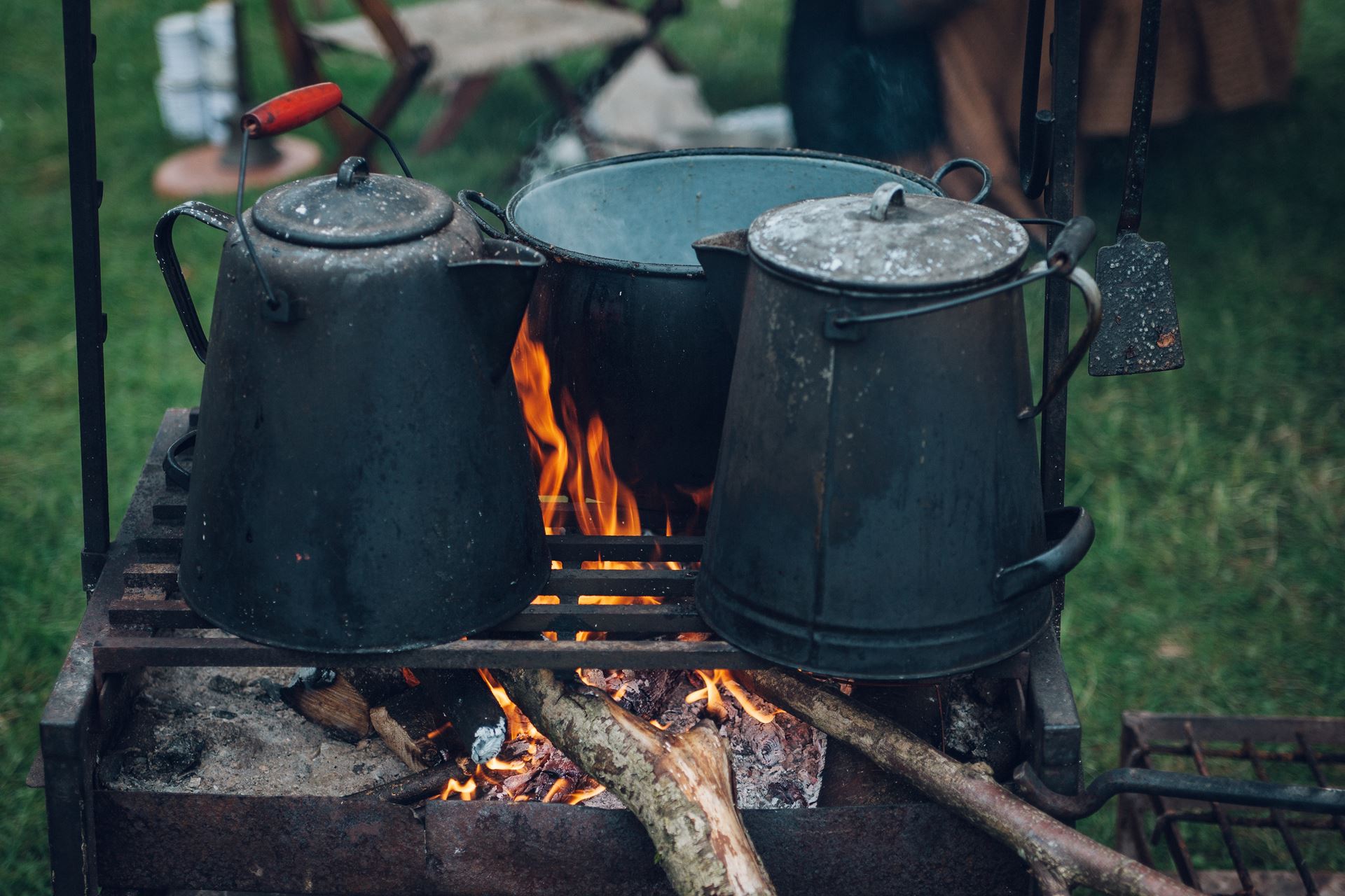 kettles sitting on a fire